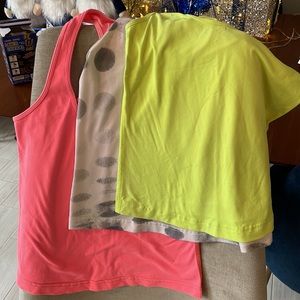 Lululemon tank tops. Pink, yellow, white with grey Polk dots. Size 6